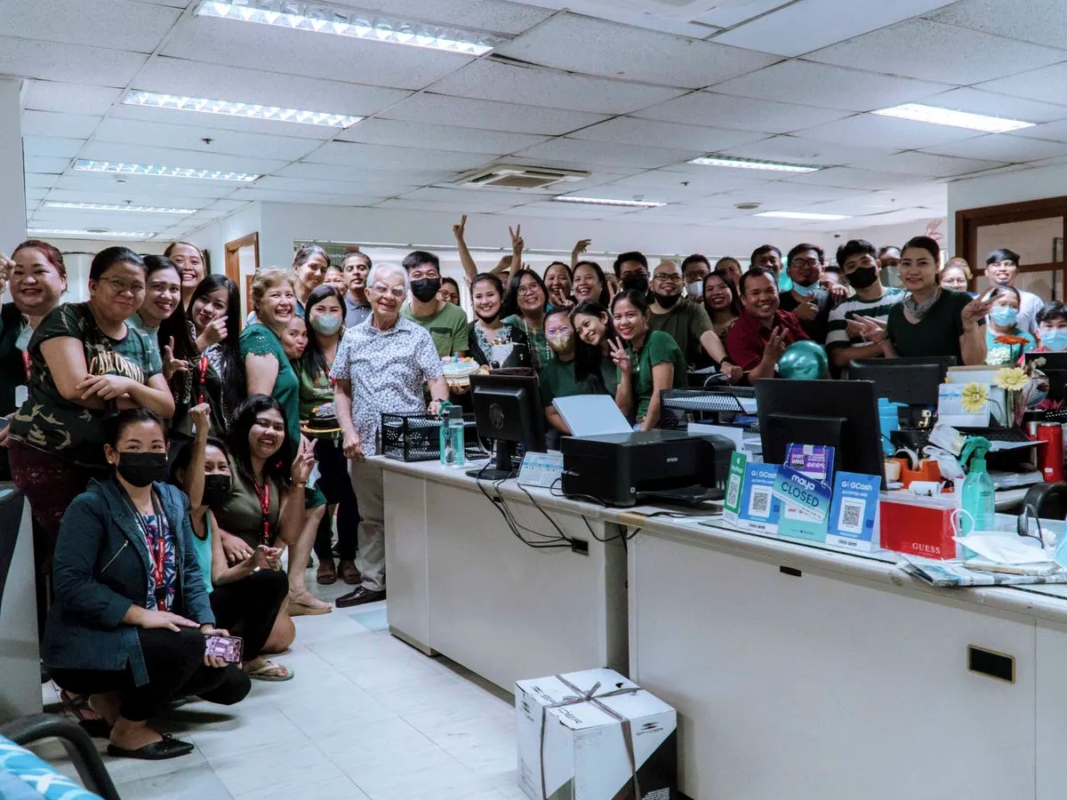 The office team together at headquarters