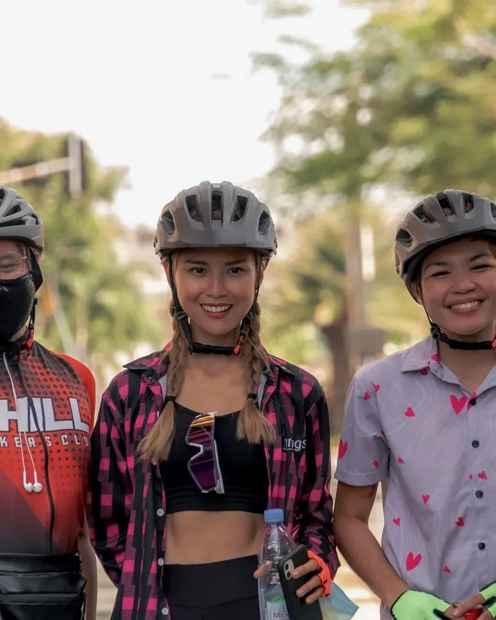 Riders in helmets at a cycling event