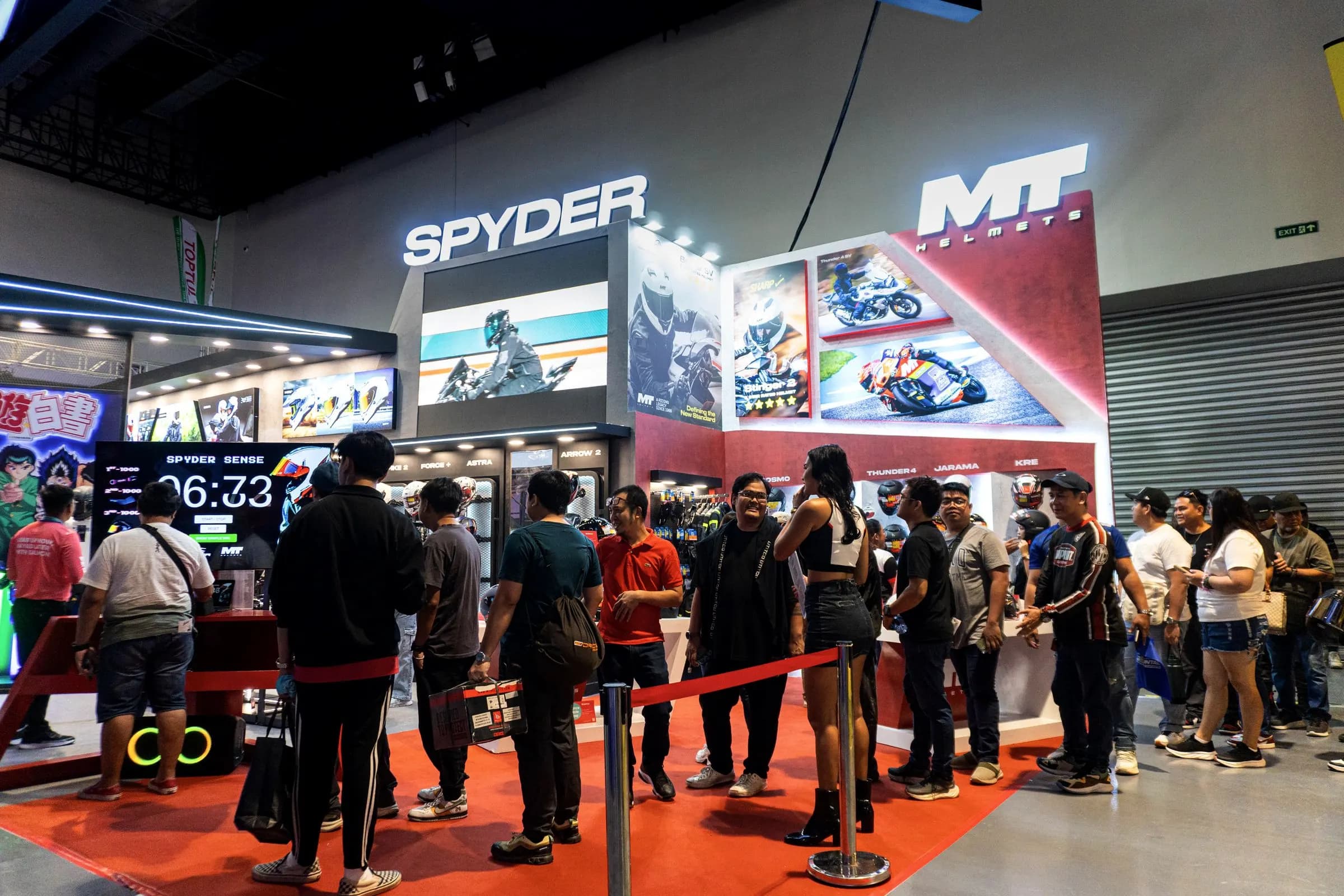 Shoppers at the Spyder and MT Helmets booth